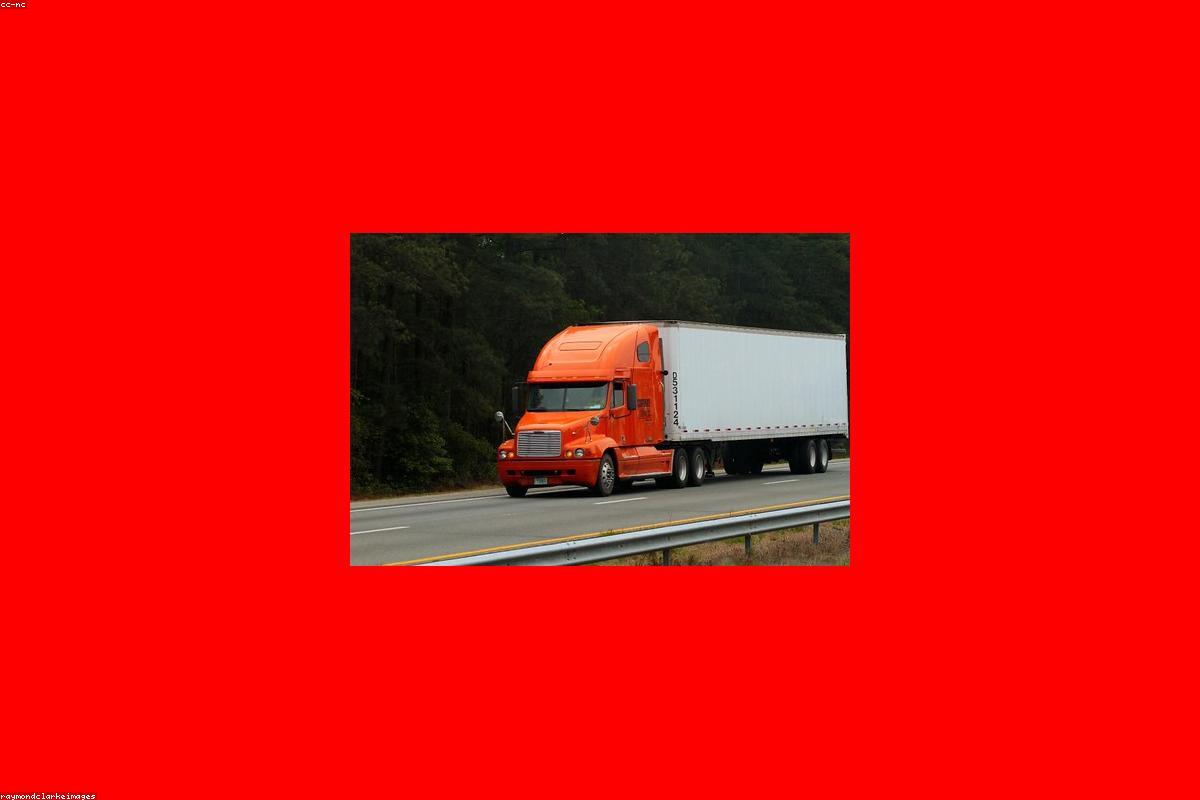 Modern freight trucks on open highway